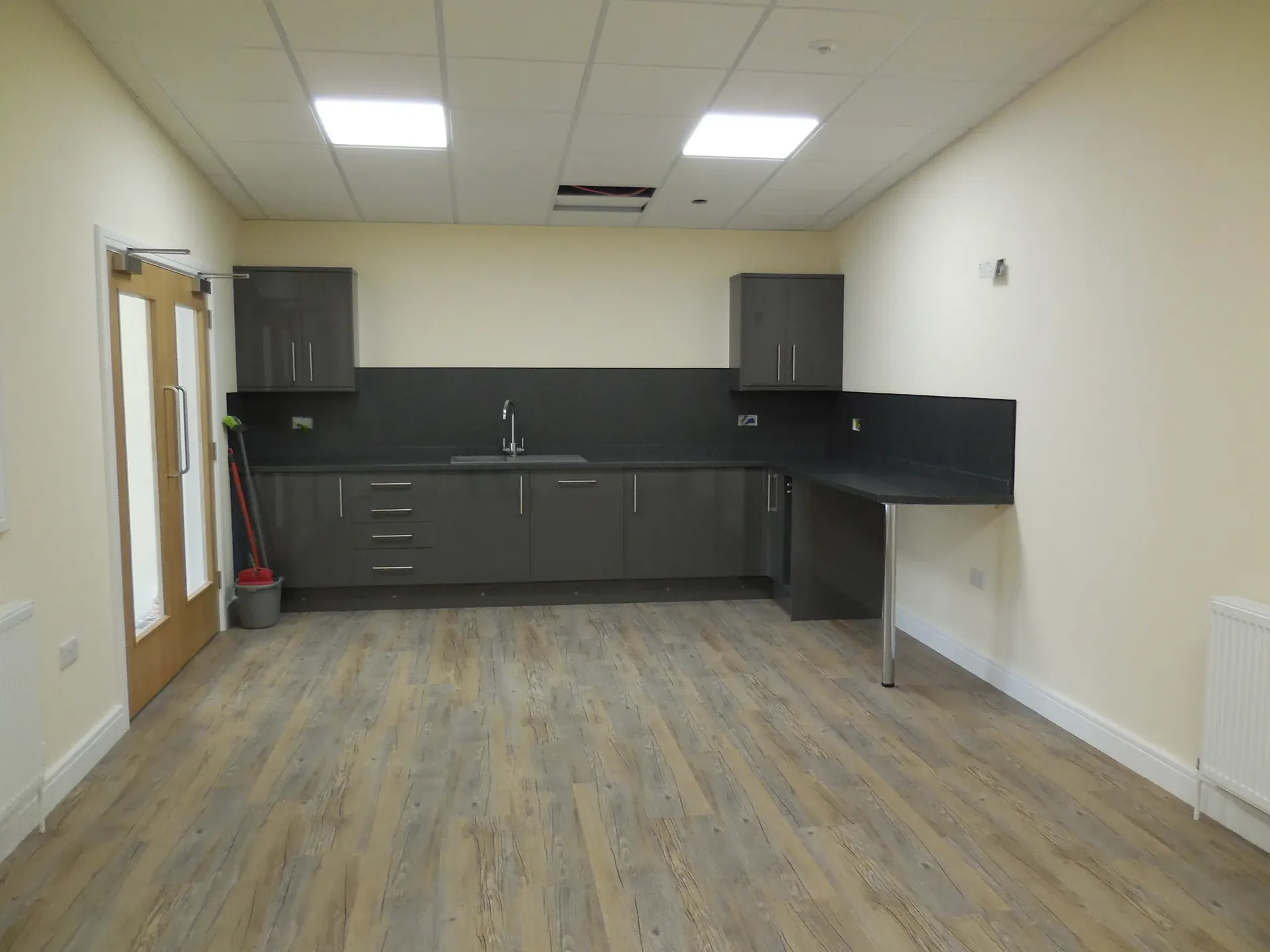 Composite House kitchenette and breakout area
