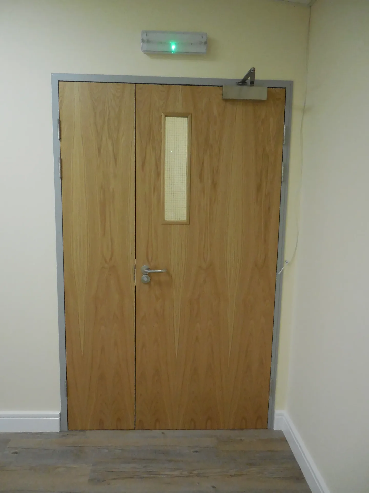 Solid oak internal double doors with emergency light